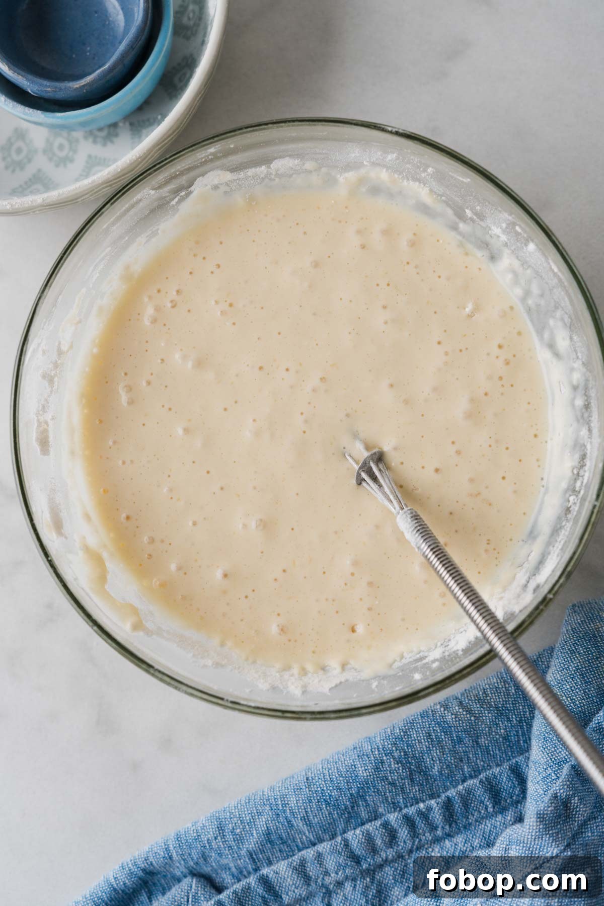 mixing the pancake batter.