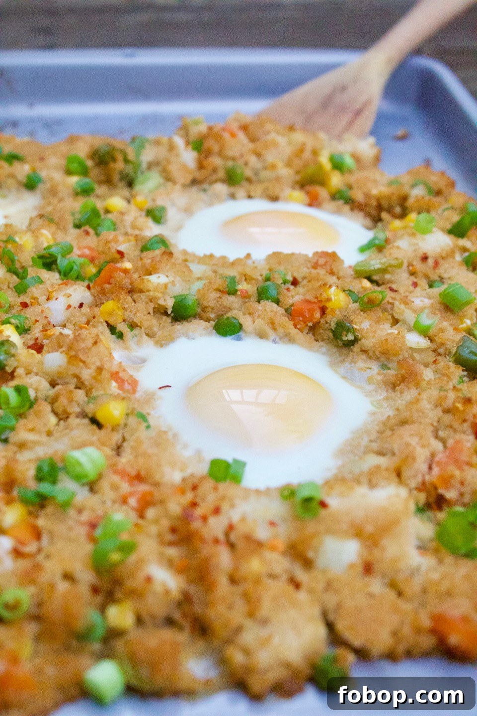 Sheet Pan Cauliflower Fried Rice Recipe for Quick Weeknight Meals 4 A low-carb and gluten free cauliflower fried rice recipe that's thrown on a sheet pan and baked in the oven. Only 7 ingredients, and made in under 20 minutes! | @sinfulnutrition | #thereciperedux