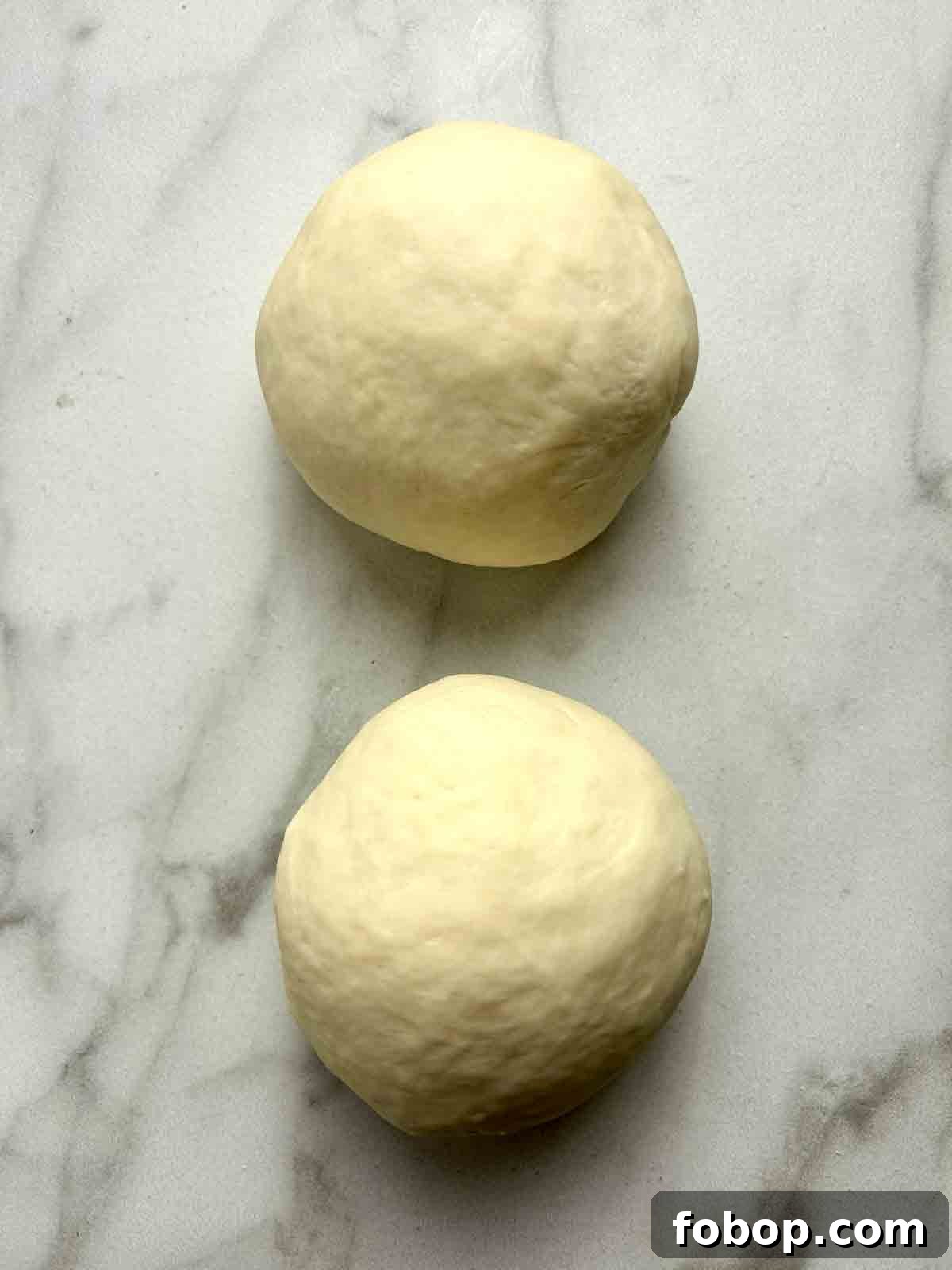 Crispy Cracker-Crust Pizza Recipe: Thin, Crunchy Homemade Pie 5 dough divided into two portions
