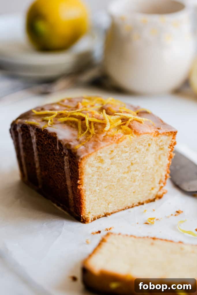 side view of a loaf of lemon cake