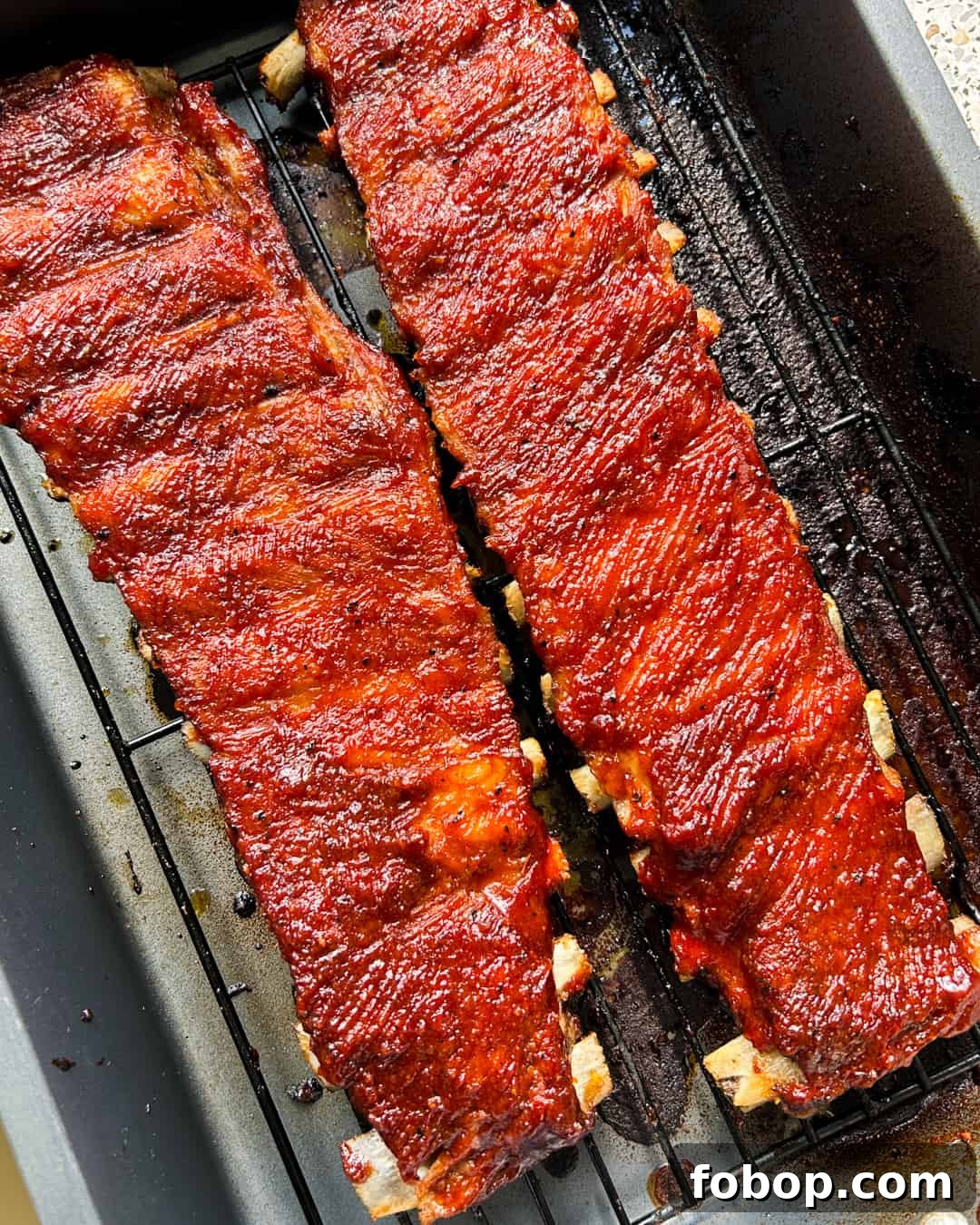 Oven-Baked BBQ Ribs with Dill Pickle Slaw — Paleo & Gluten-Free 3 Tender Juicy Oven Baked BBQ Ribs with Paleo Homemade BBQ Sauce