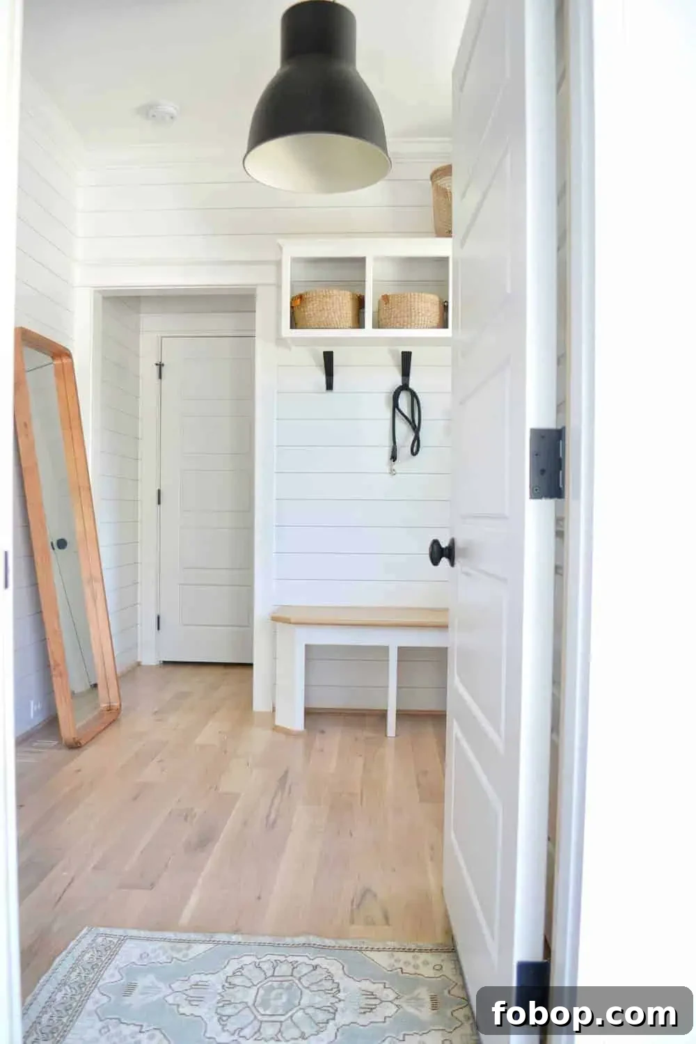 How to Begin Organizing Your Home: A Simple Room-by-Room Plan 5 statement lighting in the organized mudroom with shoe organization