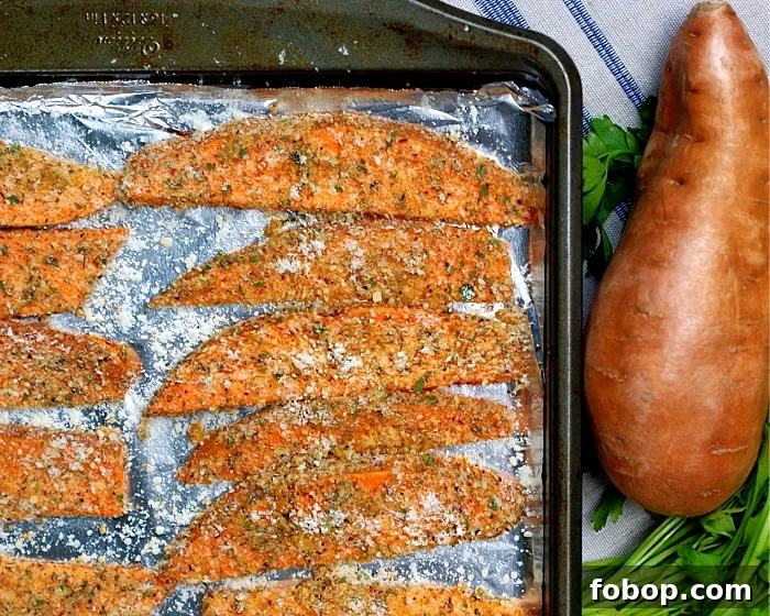 Garlic Parmesan Roasted Sweet Potato Wedges 4 Sweet Potato Wedges coated with Parmesan