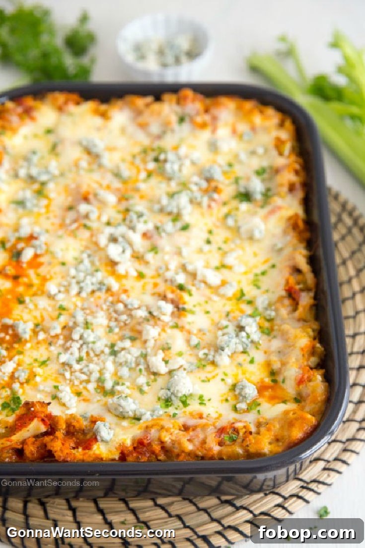 Easy Buffalo Chicken Lasagna in a black casserole dish