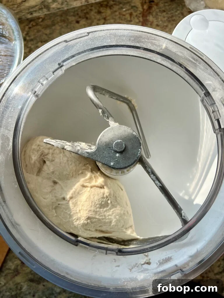 Soft Rosemary Sourdough Loaf: Tender Crust and Aromatic Herb Flavor 6 Kneading dough