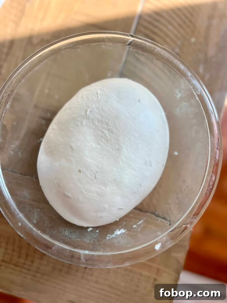 Soft Rosemary Sourdough Loaf: Tender Crust and Aromatic Herb Flavor 7 Dough after bulk fermentation