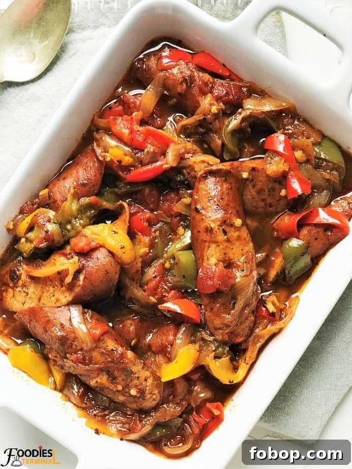 Instant Pot Sausage with Peppers and Onion Dinner 2 Instant Pot Sausage and Peppers in a white serving container
