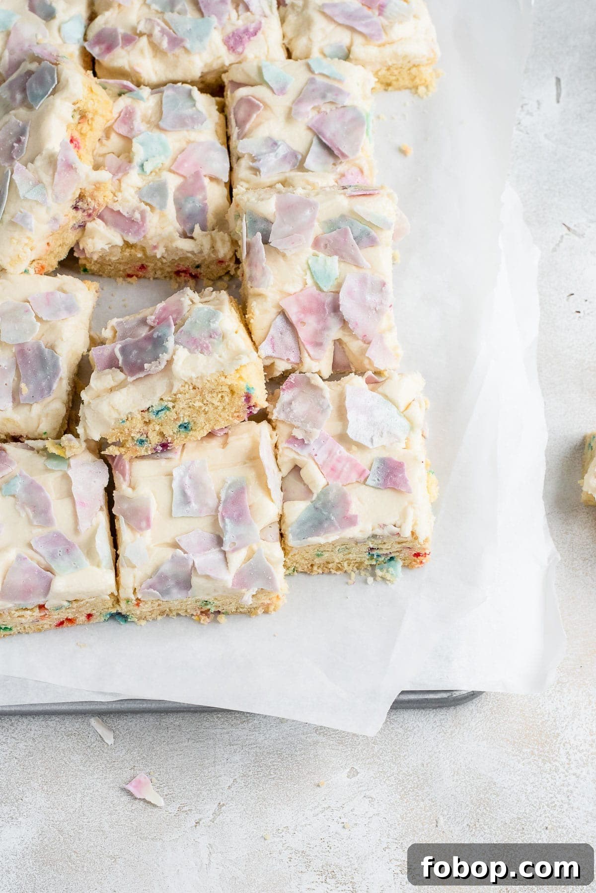 cookies scattered on parchment paper
