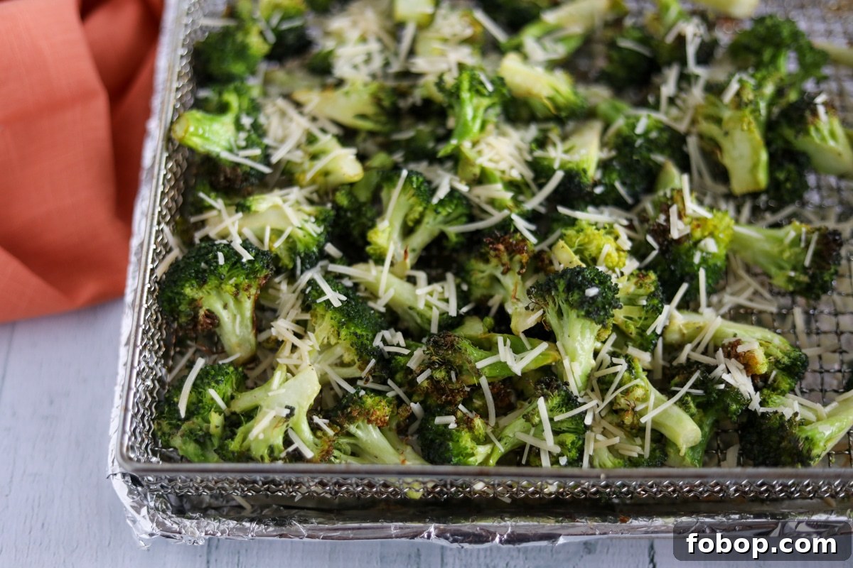 Crispy Garlic Lemon Air Fryer Broccoli Recipe 6 roasted broccoli covered with parmesan cheese