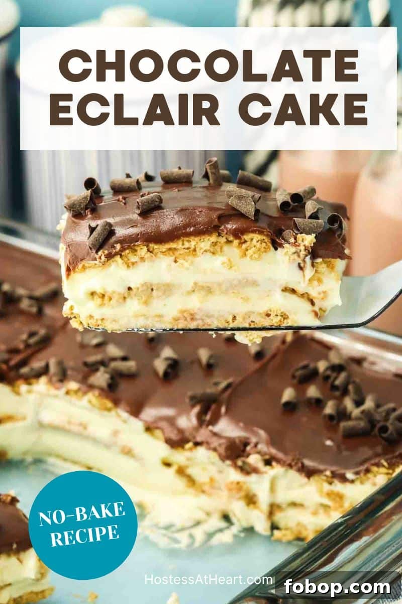 No-Bake Chocolate Eclair Cake Recipe (No Oven Needed) 15 An image for Pinterest of a Close-up of no-bake eclair cake slice showing creamy pudding layers between softened graham crackers and topped with chocolate ganache and chocolate curls - Hostess At Heart