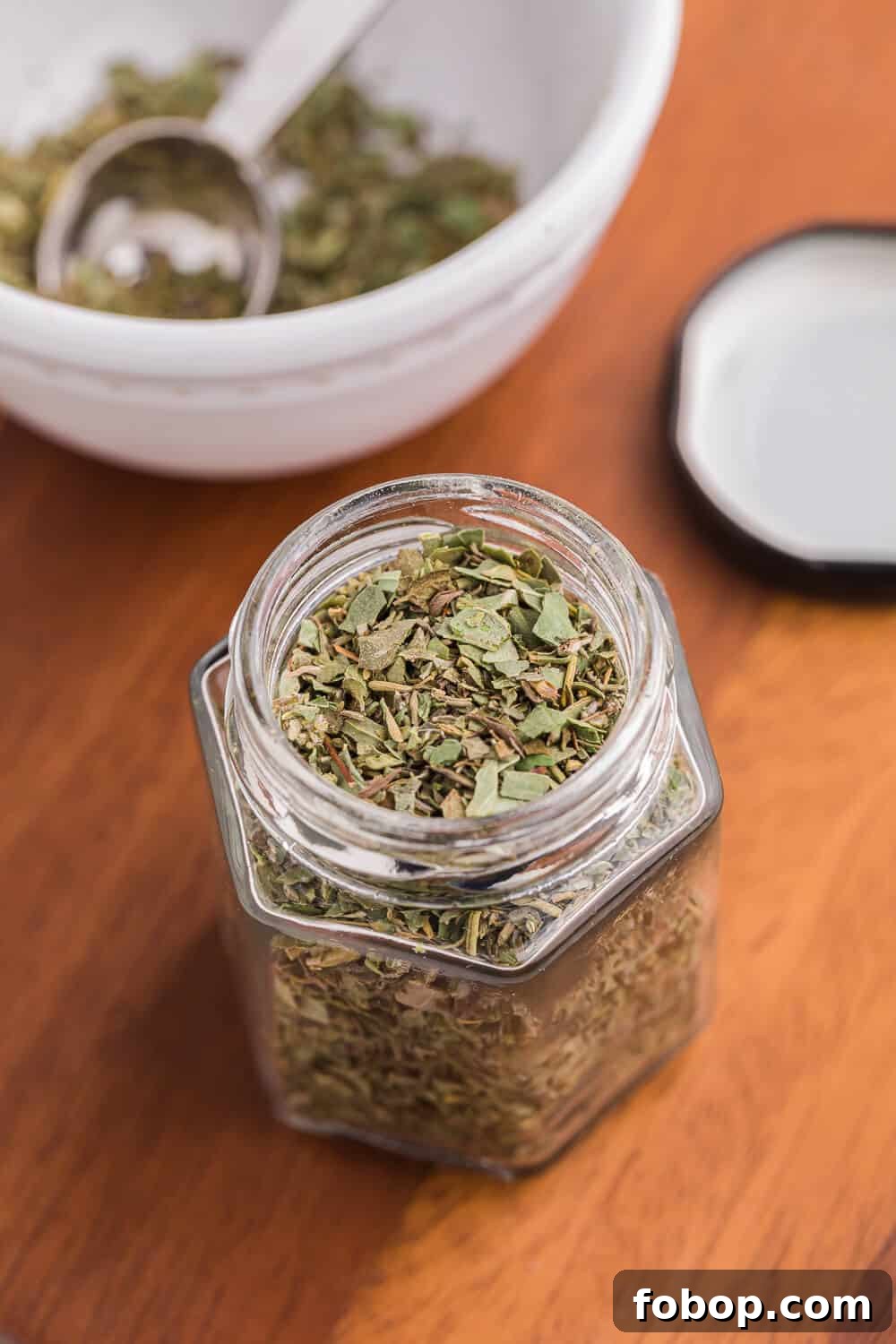 Italian seasoning in a spice jar.