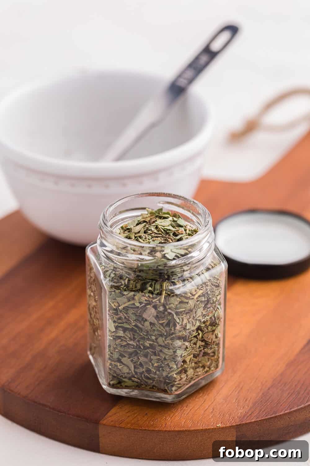 Italian seasoning in a spice jar.