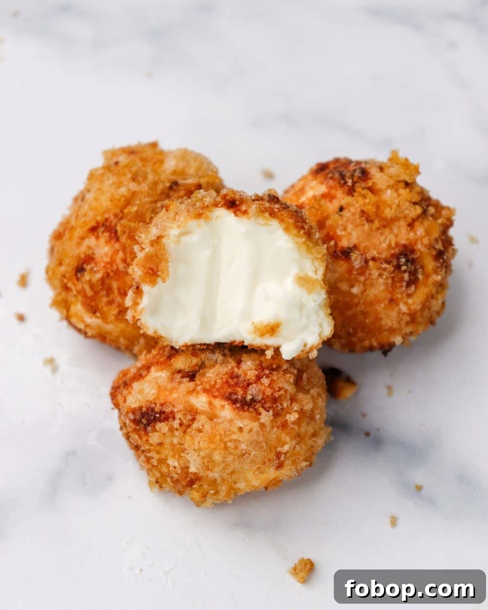 Crispy Air Fryer Carnivore Cream Cheese Bites 2 Air Fryer Crispy Carnivore Cream Cheese Bites with bite taken out