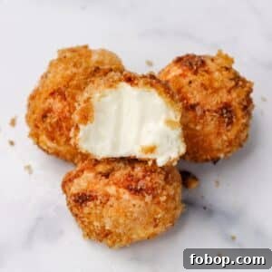 Crispy Air Fryer Carnivore Cream Cheese Bites 11 Air Fryer Crispy Carnivore Cream Cheese Bites with bite taken out