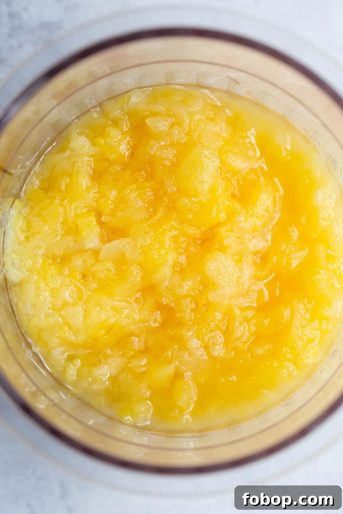Make Dole Whip with Your Ninja Creami: Simple Recipe Guide 3 Crushed pineapple in ninja creami container
