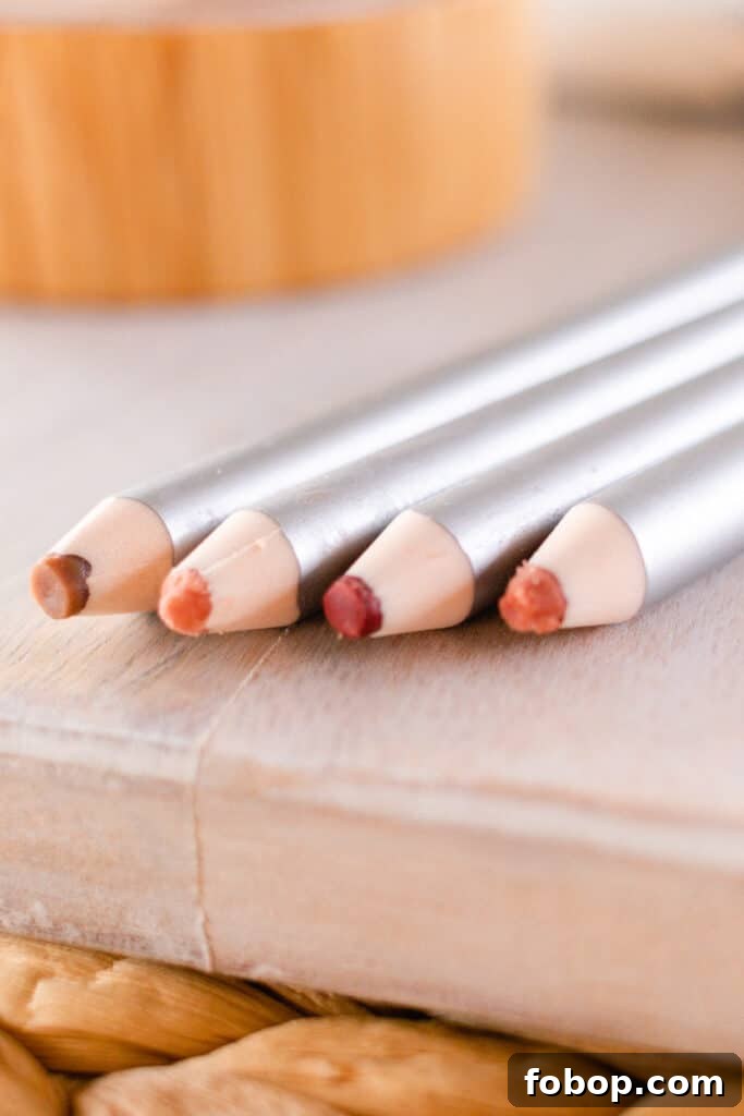 Make Your Own Natural Makeup: Simple DIY Recipes and Tips 11 Homemade lip liner pencils on the edge of the vanity.