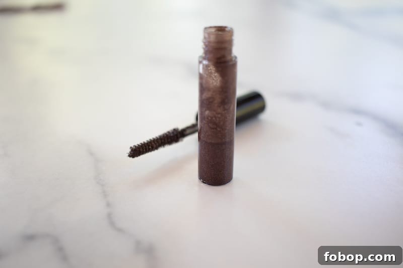 Make Your Own Natural Makeup: Simple DIY Recipes and Tips 4 Diy eyebrow gel in a small glass container.