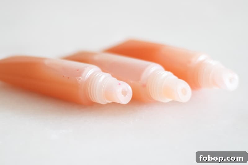 Make Your Own Natural Makeup: Simple DIY Recipes and Tips 9 three tubes of pink lip gloss