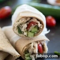 Mediterranean Chicken Wrap Recipe with Tzatziki and Feta 8 Greek Chicken Wraps with tomatoes, cucumbers, and olives.