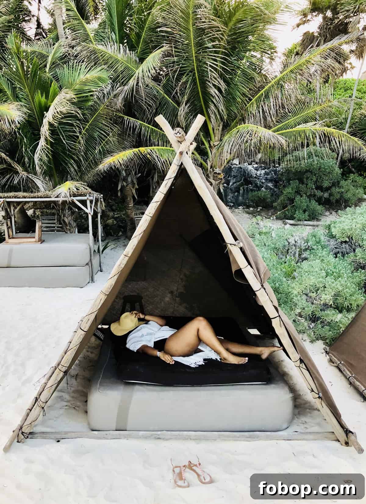 Tulum Travel Guide: Top Eats, Hotels, and Must-See Activities 5 Jessica asleep in a beach hut.