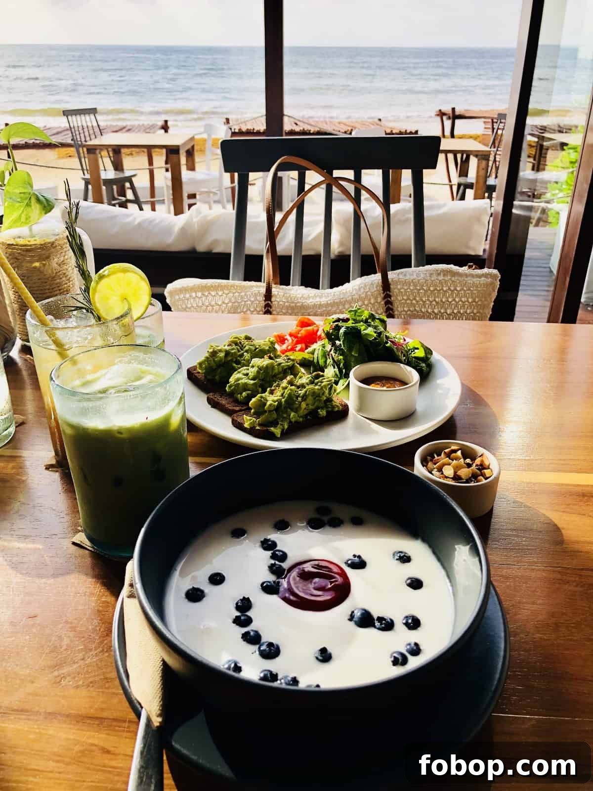 Tulum Travel Guide: Top Eats, Hotels, and Must-See Activities 9 A bowlof soup on a restaurant table, by the beach.