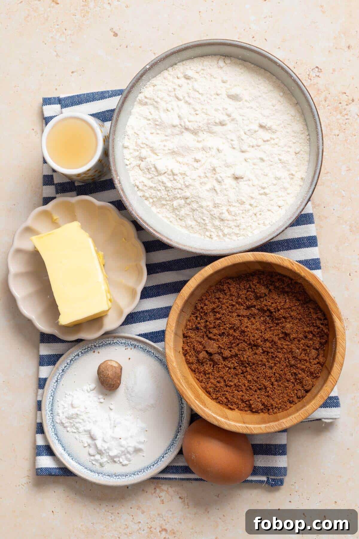 Small-Batch Brown Sugar Cookie Recipe for Perfect Soft Bites 3 A bowl of flour, eggs, brown sugar and other ingredients on a table.