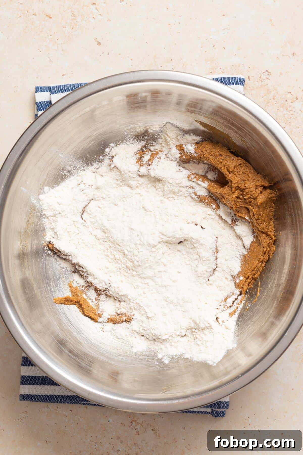 Small-Batch Brown Sugar Cookie Recipe for Perfect Soft Bites 8 A bowl with flour and brown sugar cookie dough mixture.