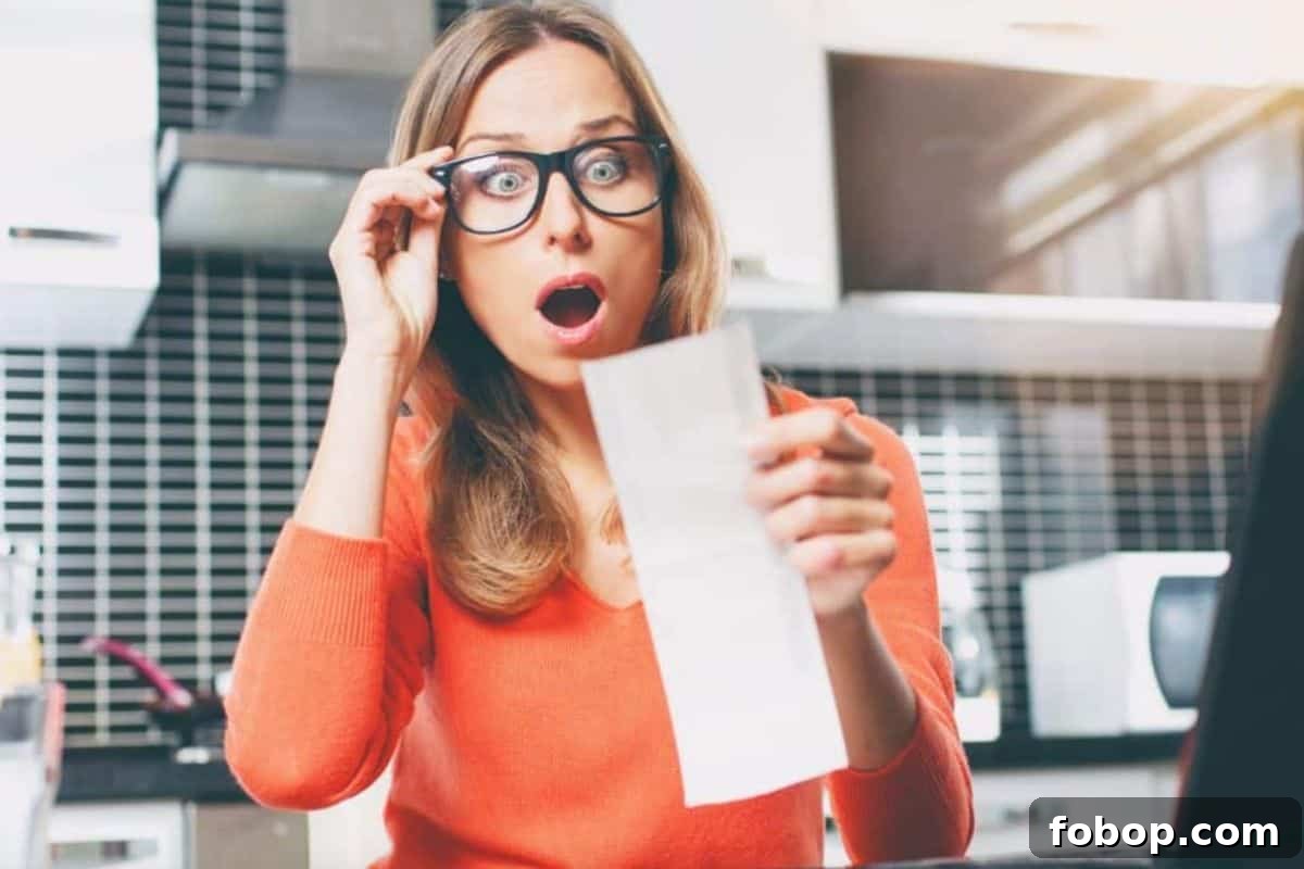 14 Situations When Pre-Cut Garlic Beats Fresh Garlic 2 Woman looking at grocery bill in shock
