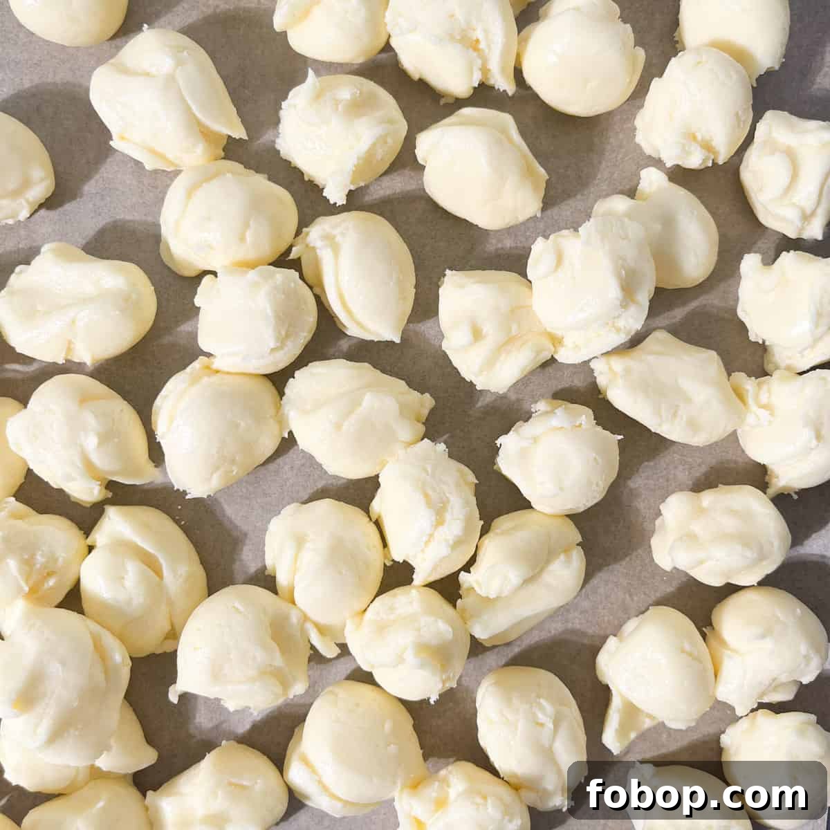 Pieces of measured out sequilho dough, ready to be rolled into balls.