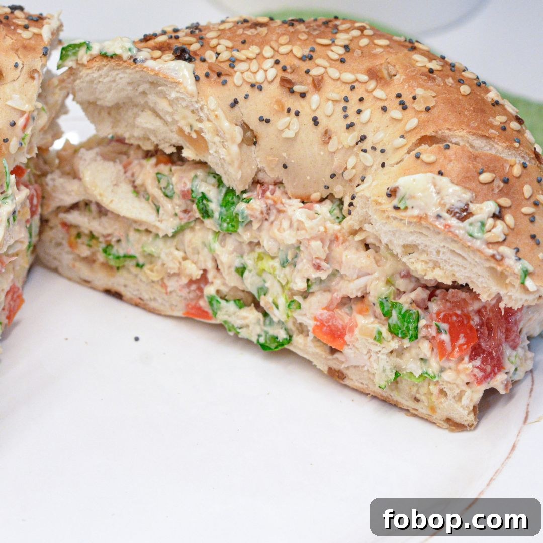 These chopped chicken bacon ranch salad bagels are the ultimate 15-minute lunch! Made with rotisserie chicken, crispy bacon, fresh tomatoes, lettuce, and ranch-seasoned cream cheese—every bite is packed with bold flavor and satisfying crunch.