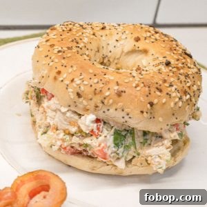 These chopped chicken bacon ranch salad bagels are the ultimate 15-minute lunch! Made with rotisserie chicken, crispy bacon, fresh tomatoes, lettuce, and ranch-seasoned cream cheese—every bite is packed with bold flavor and satisfying crunch.