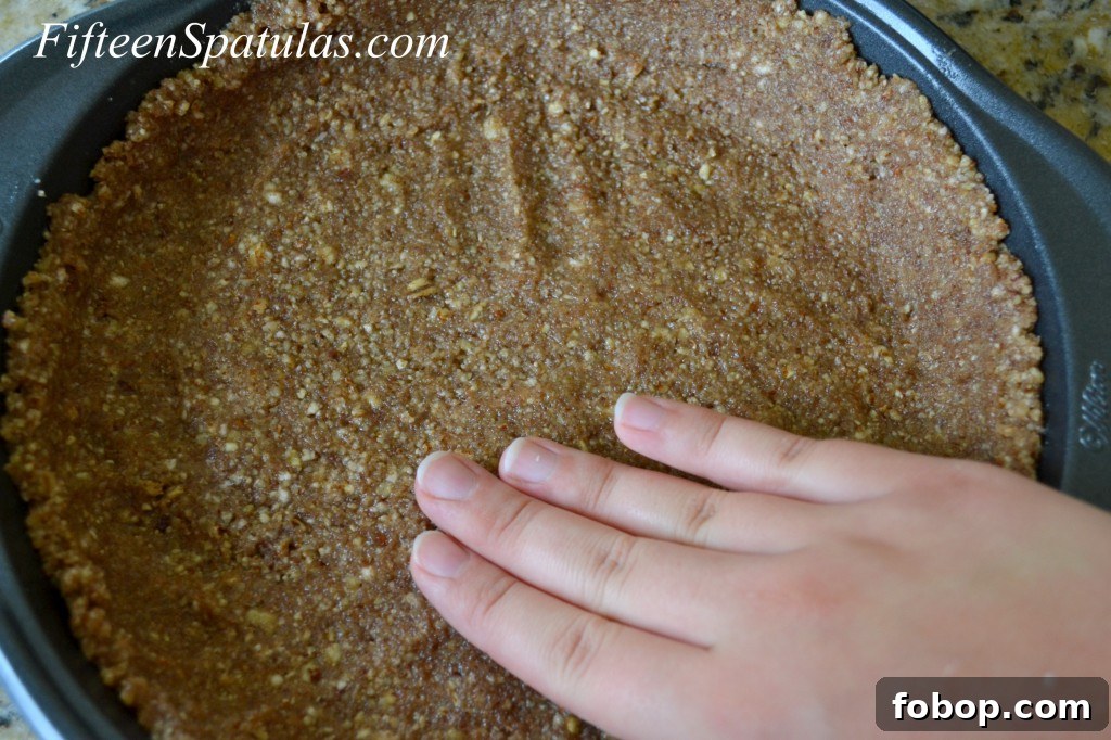 SweetPotatoCheesecake3 Pecan Crust - Patted into Metal Cheesecake Pan with Fingers