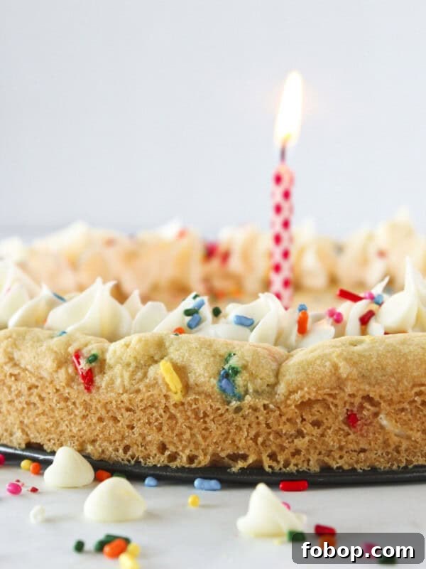 Ultimate Golden Oreo Cake Recipe: Moist, Crunchy Dessert 11 A birthday cookie cake with sprinkles and a candle.