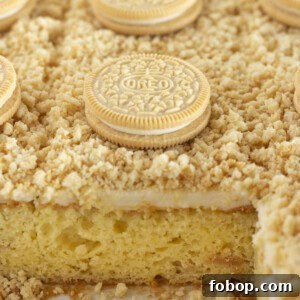 Ultimate Golden Oreo Cake Recipe: Moist, Crunchy Dessert 12 Golden Oreo Cake with cookies baked inside and topped with them.