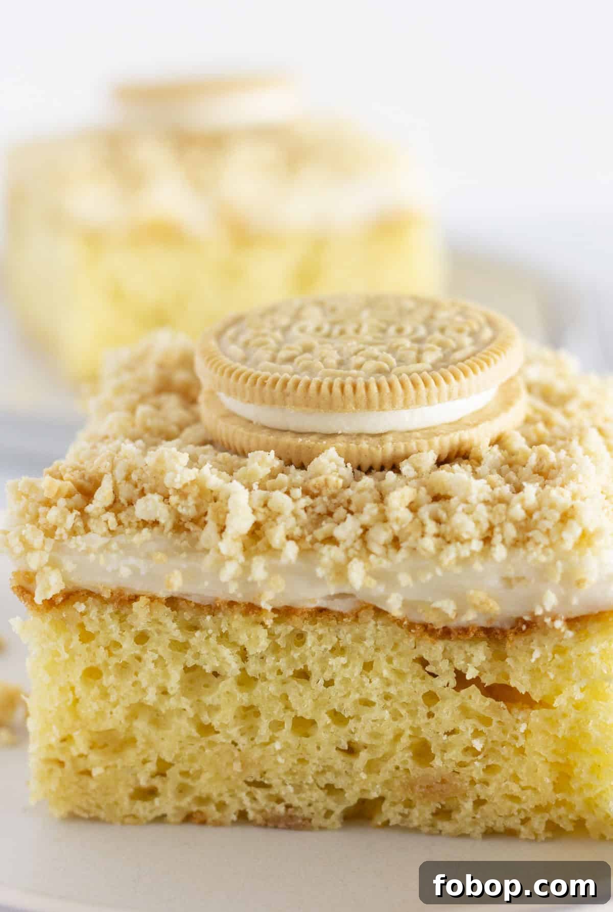 Ultimate Golden Oreo Cake Recipe: Moist, Crunchy Dessert 7 A piece of Golden Oreo cake on a plate to serve.