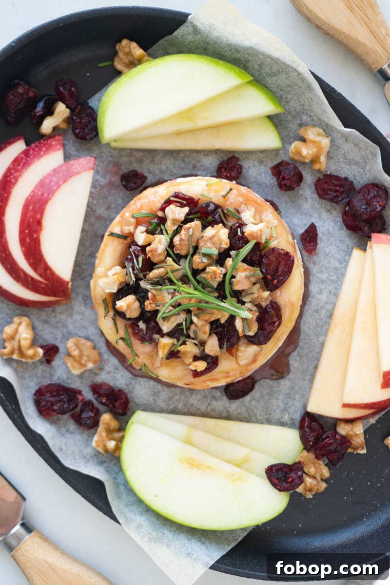 warm brie appetizer on platter