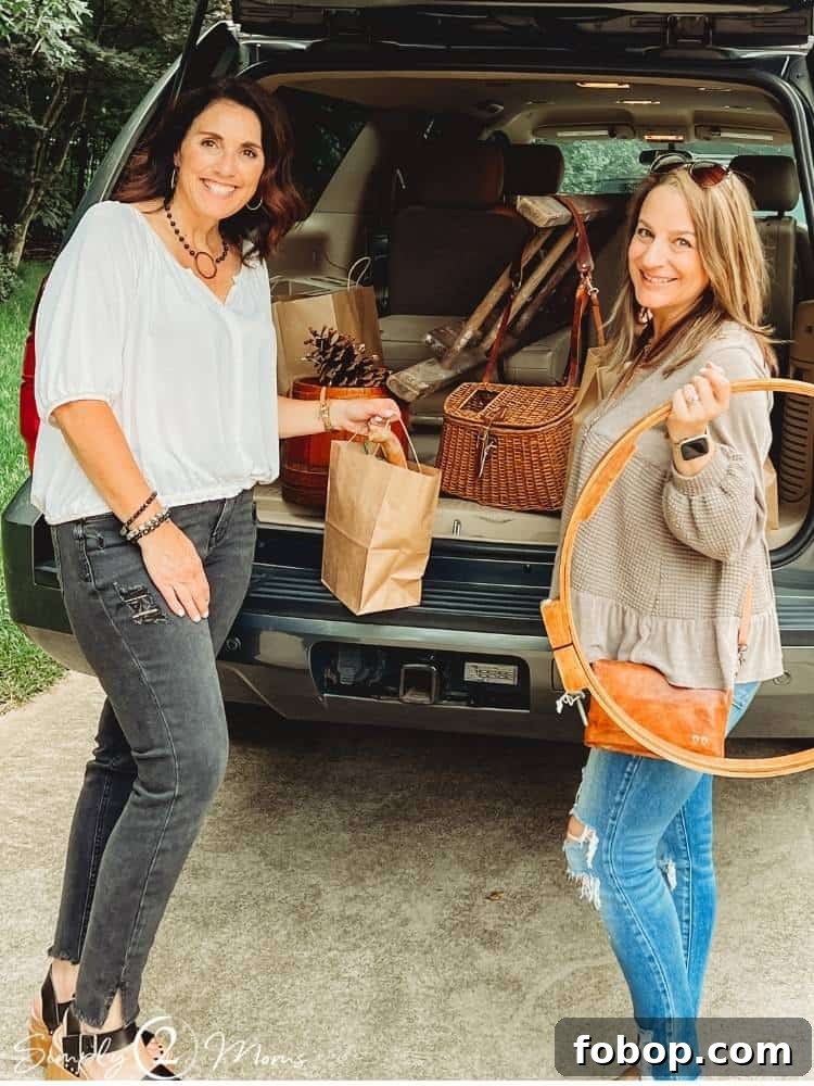 AnnMarie and Anne with haul in back of car from thrifting
