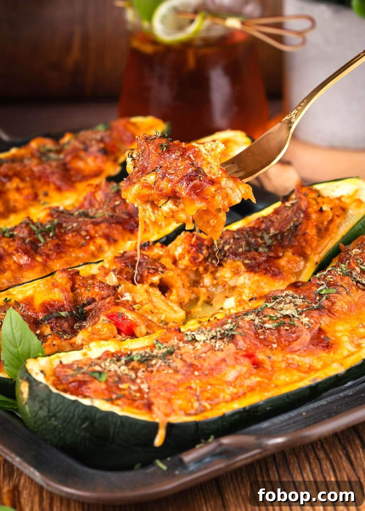 bite of stuffed zucchini on a fork.