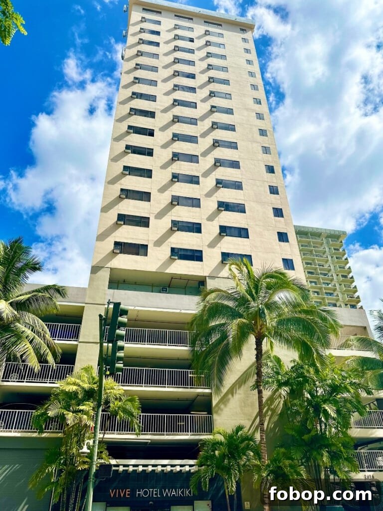 Vive Hotel Waikiki — Boutique Oceanfront Stay in Waikiki 2 The Vive Hotel Waikiki hotel building on Kūhiō Ave in Waikīkī.