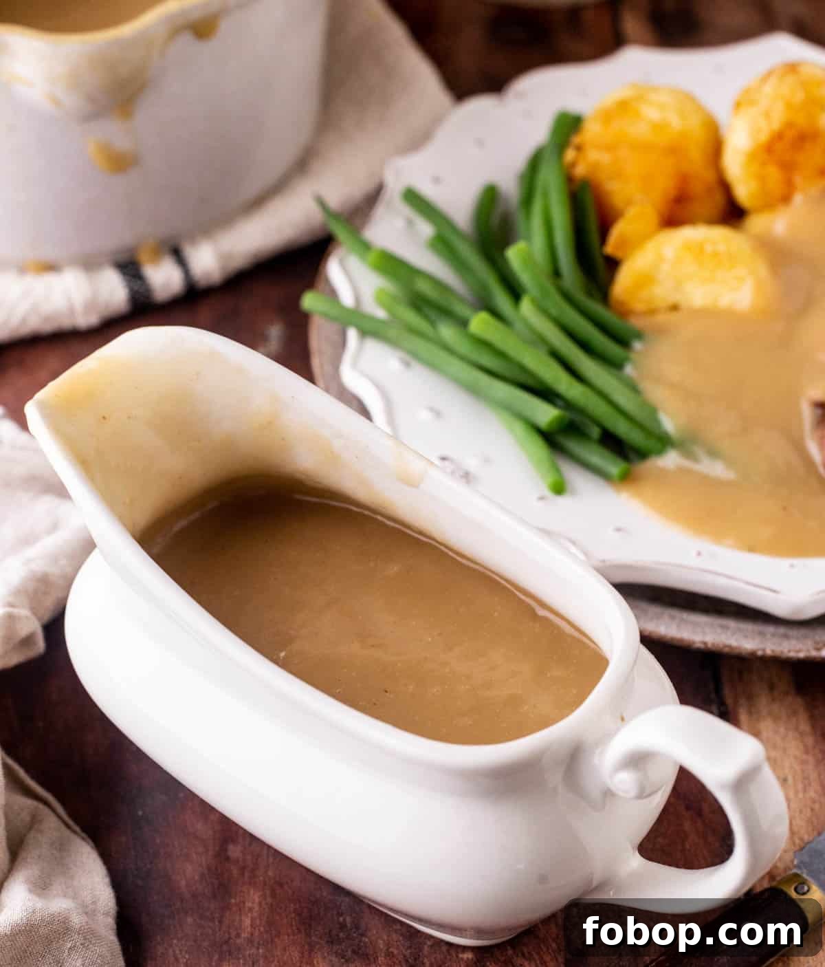 Gluten-Free Gravy in a gravy boat on a wooden table