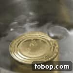 How to Make Creamy Homemade Dulce de Leche Quickly 6 boiling a can of sweetened condensed milk in a large pot.