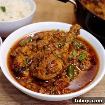 dum ka murgh served in a white bowl.