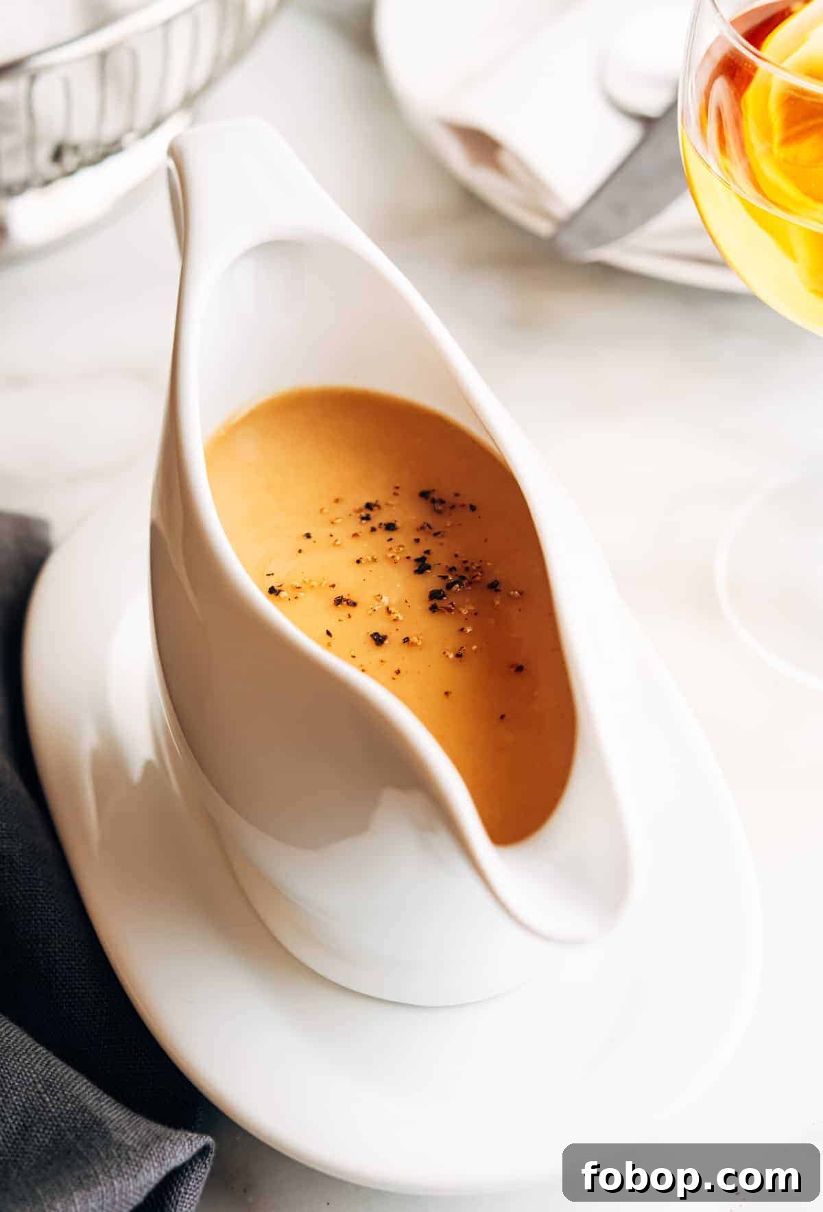 Turkey Gravy without Drippings in a white ceramic gravy boat.