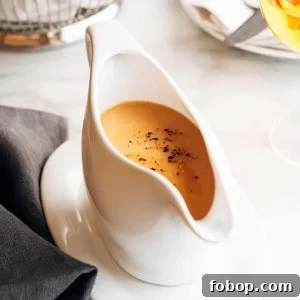 Turkey Gravy without Drippings in a white ceramic gravy boat.