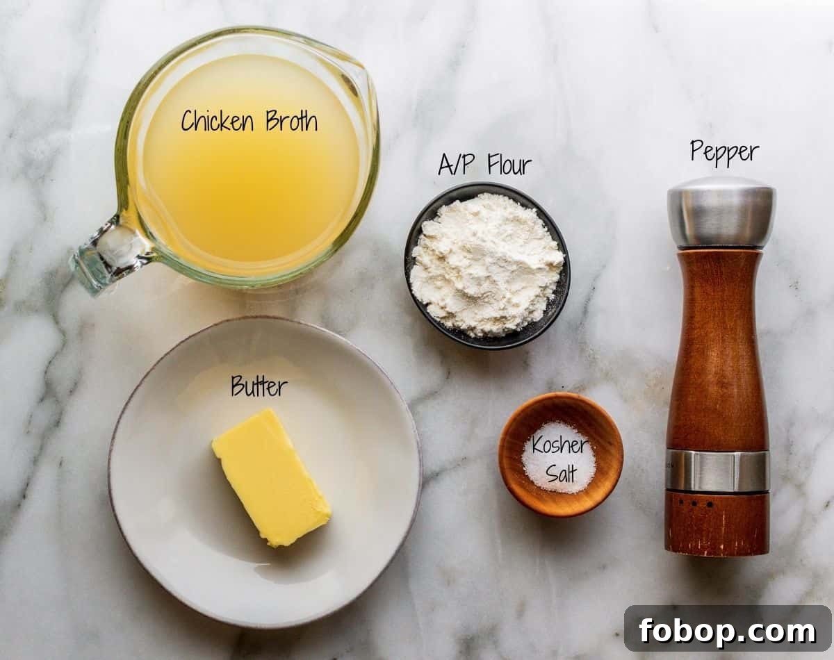 Turkey Gravy without Drippings Ingredients on a white marble board.