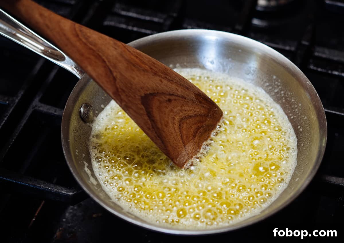 butter sizzling in a skillet.