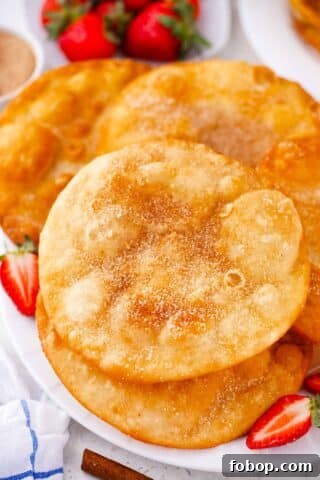 crispy bunuelos covered in cinnamon sugar