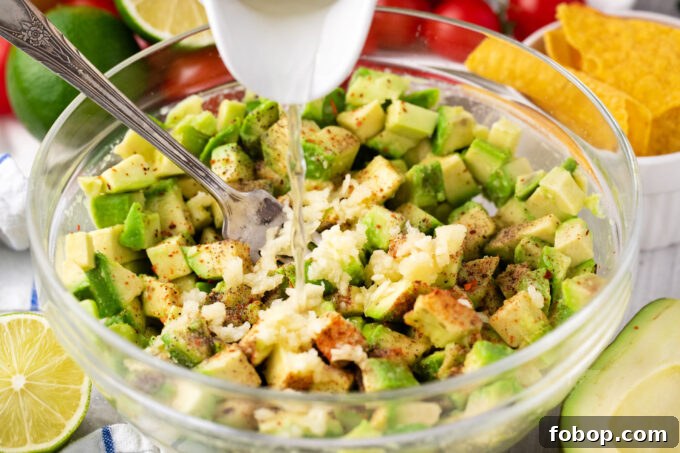 Mixing guacamole ingredients into a bowl.