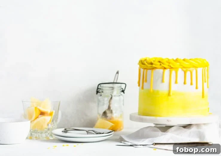 cake with a jar of lemons and lemon curd in the background