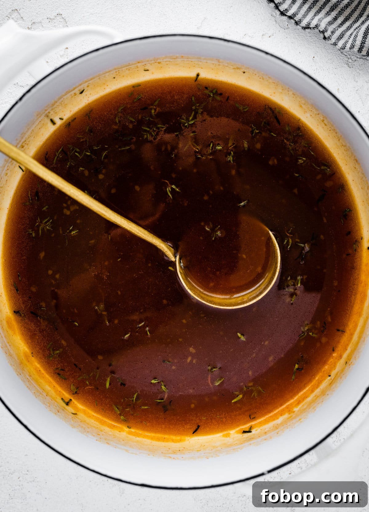 Brown sugar glaze for ham cooked in a pot.